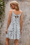White dress with leopard pattern