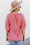 Pink top with ruffles