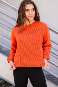 Dark orange long-sleeved knitted sweater
