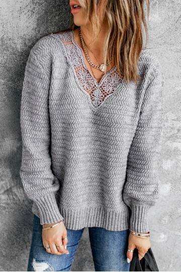 Loose gray V-neck sweater