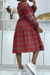 Red plaid dress with embroidery.