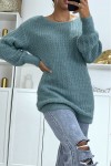 Chunky knit halterneck sweater with puff sleeves.
