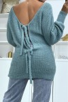Chunky knit halterneck sweater with puff sleeves.