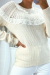 Sweater with round neck and ruffles in classic vintage style.