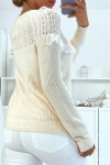 Sweater with round neck and ruffles in classic vintage style.