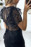 Black lace blouse with ruffled puff sleeves and bow