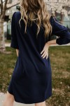 Black shift dress with ruffled sleeves