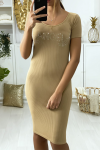 Beige tight dress with "ANGEL" rhinestone writing and wings