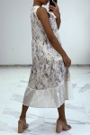 Long flowing dress with blue floral print with openwork embroidery details.