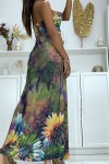 Long yellow floral dress with rhinestones and pleats at the bust.