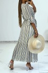 Long dress with yellow stripes and 3/4 sleeves with ruffles in vintage style.