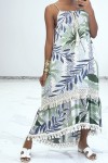 Long strap dress with green pattern with lace and pompom.