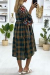 Green plaid dress with embroidery.