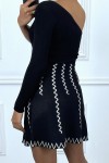 Black asymmetrical ribbed jumper dress with zig zag pattern, one long sleeve