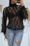 Black embroidered mesh top with roll neck and ribbed sleeves.