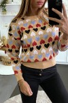 Short beige sweater with heart pattern