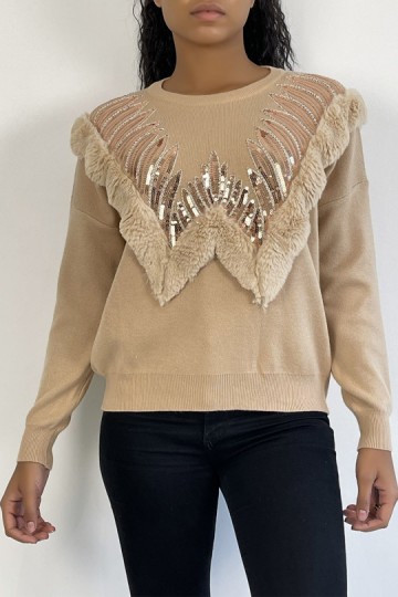 Beige sweater with round neck and faux fur and rhinestone pattern.