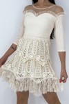 Chic pale pink dress with 3/4 sleeves and openwork fringed lining.