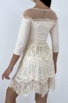 Chic pale pink dress with 3/4 sleeves and openwork fringed lining.