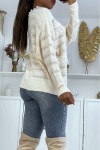 Openwork beige sweater with round neck and lace.