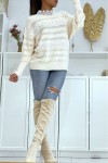 Openwork beige sweater with round neck and lace.