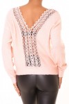 Light pink sweater with a round neck and an open lace back.
