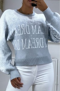 Blue to white gradient jumper in stretch material with a puffy effect and inscription.