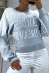 Blue to white gradient jumper in stretch material with a puffy effect and inscription.