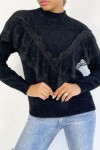 Very soft black jumper with high collar and retro style embroidered frill.