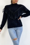 Very soft black jumper with high collar and retro style embroidered frill.