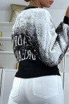 Black jumper with white gradient in stretch material with puffy effect and inscription.