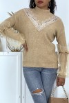Taupe high neck sweater with tulle puff sleeves.