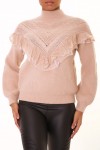 Taupe sweater with V pattern and ruffle details.