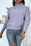 Chunky lilac sweater with stand-up collar.