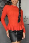 Red ribbed jumper with peplum cut and high neck