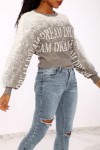 Gray to white gradient jumper in stretch material with a puffy effect and inscription.
