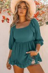 Green smocked blouse with ruffles