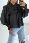 Classic style black blouse with ruffles and puff sleeves.