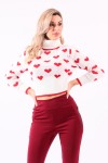 White sweater with red hearts