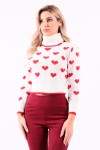White sweater with red hearts