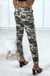 Military slim pants for women with pockets and silver pattern on the legs.