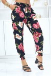 Black pants with elastic flowers at the waist and ankles