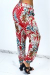 Red flowing pants with dotted stripes and floral print