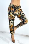Fluid black pants with multicolored tropical pattern