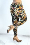 Fluid black pants with multicolored tropical pattern
