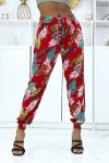 Fluid red foliage trousers with elastic waist and ankles