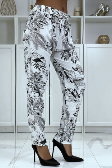 Pantalon fluide blanc à motif floral