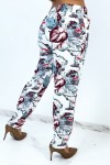 Flowing straight-cut blue pants with large tropical print