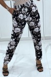 Flowing gray pants with floral pattern