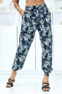 Fluid green foliage trousers with elastic waist and ankles